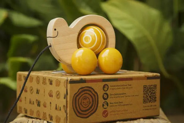 Fair & Green Spinning Snail - Baby / Ault Fair and Green