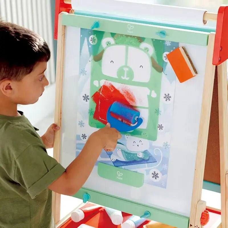 https://toys.hape.com/cdn/shop/files/Hape-All-in-One-Wooden-Kid_s-Art-Easel-with-Paper-Roll-and-Accessories-Hape-Toy-Market-44298635.jpg?v=1698550533