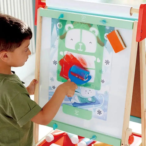 https://toys.hape.com/cdn/shop/files/Hape-All-in-One-Wooden-Kid_s-Art-Easel-with-Paper-Roll-and-Accessories-Hape-Toy-Market-44298635_large.jpg?v=1698550533