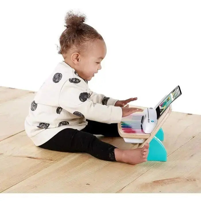 Hape and Baby Einstein Magic Touch Piano Wooden Musical Toddler Toy