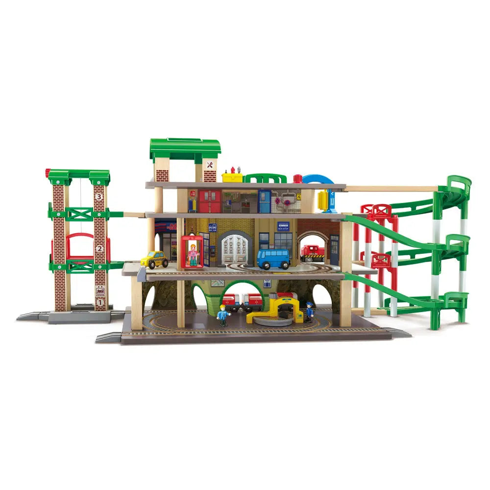 Rear view of the Hape Multi-Level Railway City Set with connected tracks and city play areas